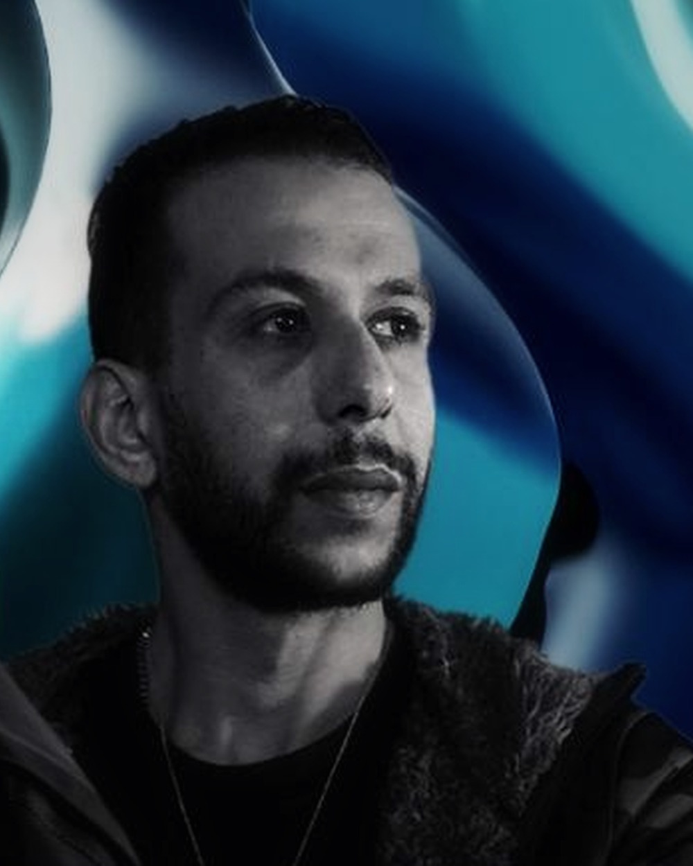 Mo Farag promotional portrait.